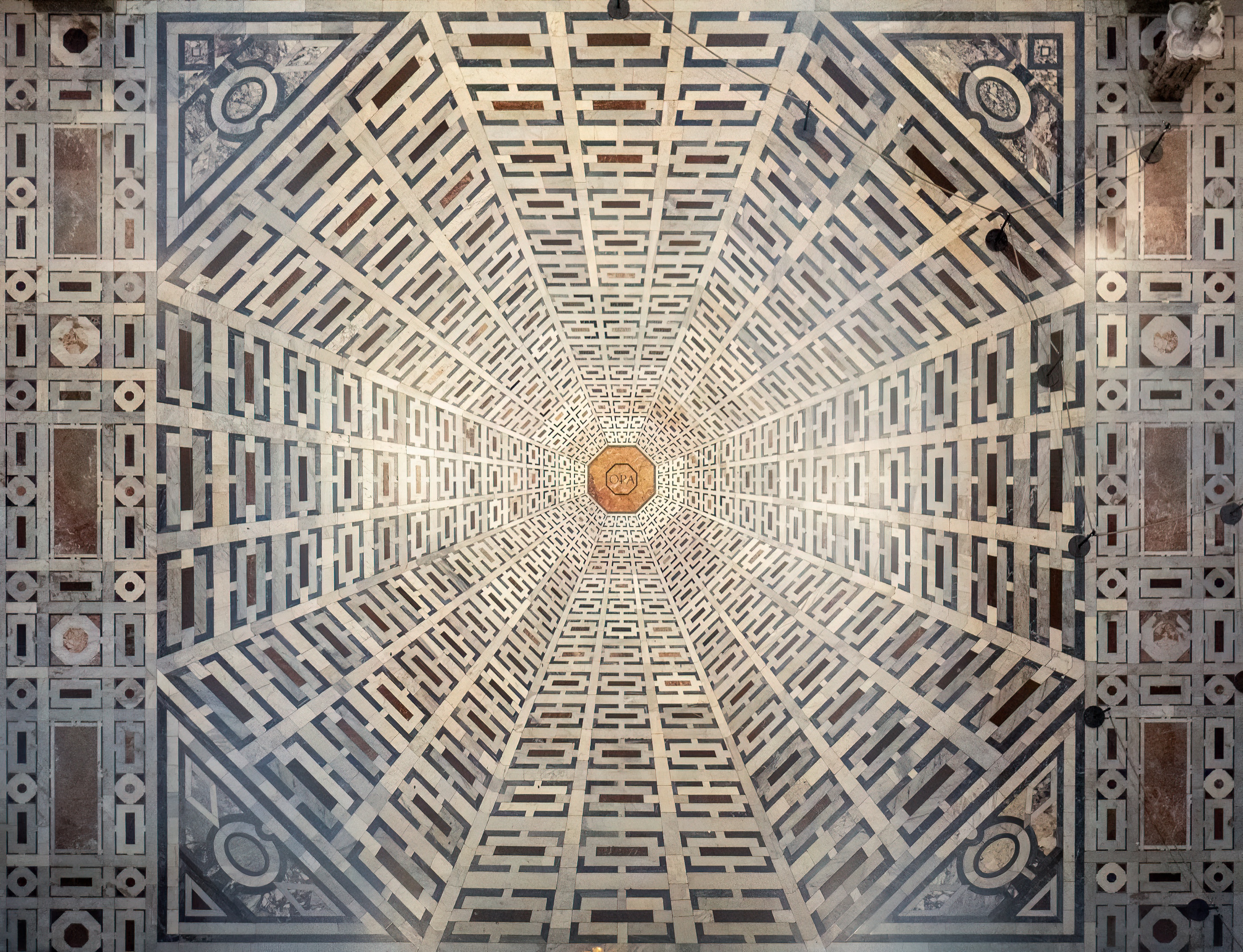 Optical illusion on the floor of the Duomo, Florence